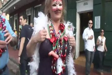 Masked beauties bare their sweet tits in public