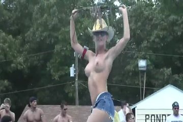 Young cowgirl shows off her perfect natural tits