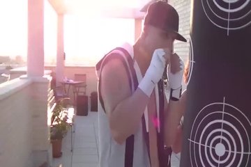 Young brunette loses (or wins?) a boxing match