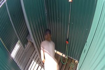 Spy cam at the beach shower