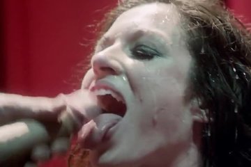 Older lady gets ravaged by two guys on stage