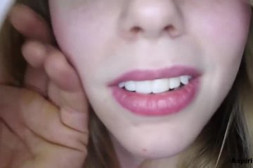 Rosy-cheeked chick blows a guy